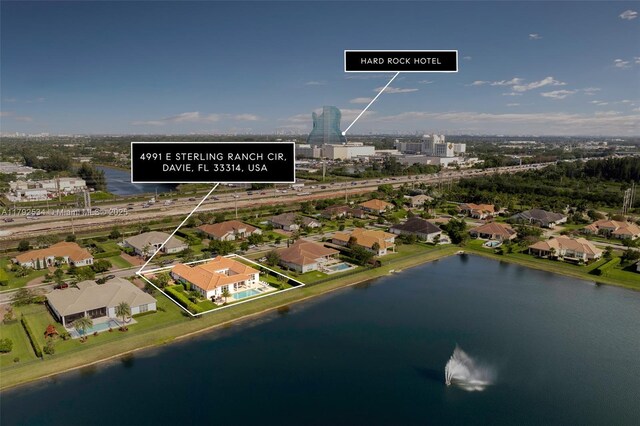 4991 E Sterling Ranch Cir, Davie, FL 33314 - aerial perspective of suburban area featuring a nearby body of water
