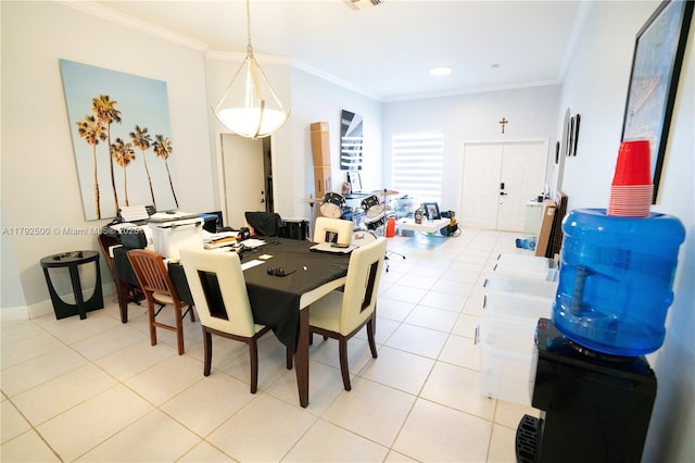 dining space featuring crown molding, tile patterned flooring, and visible vents