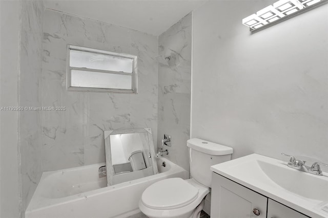 bathroom featuring vanity, bathtub / shower combination, and toilet