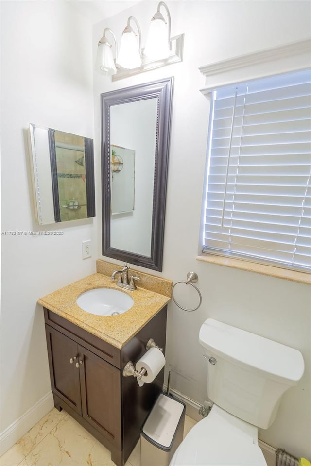 1558 Sunset Way, Weston, FL 33327 - half bath featuring toilet, baseboards, marble finish floor, and vanity