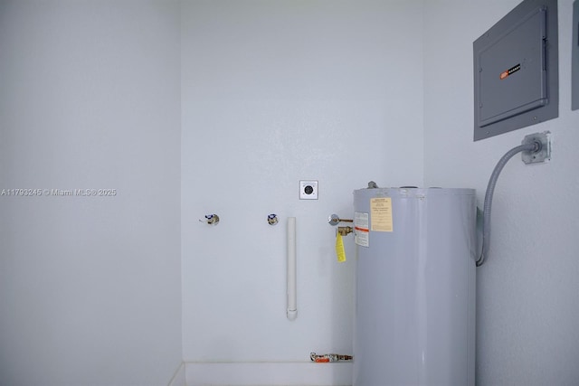 utility room with electric panel and gas water heater