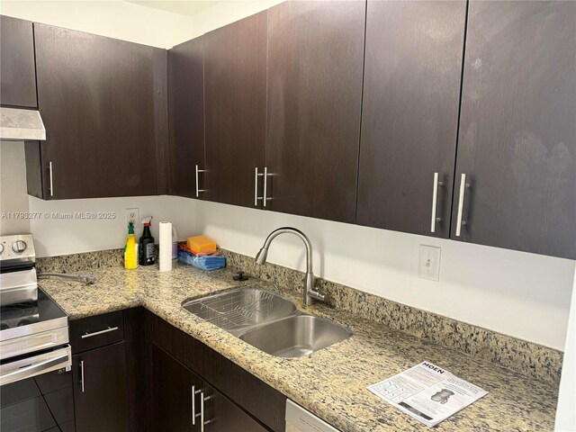 492 NW 165th St Rd Unit C-215, Miami, FL 33169 - kitchen featuring dark brown cabinets, stainless steel electric range, under cabinet range hood, light stone counters, and a sink