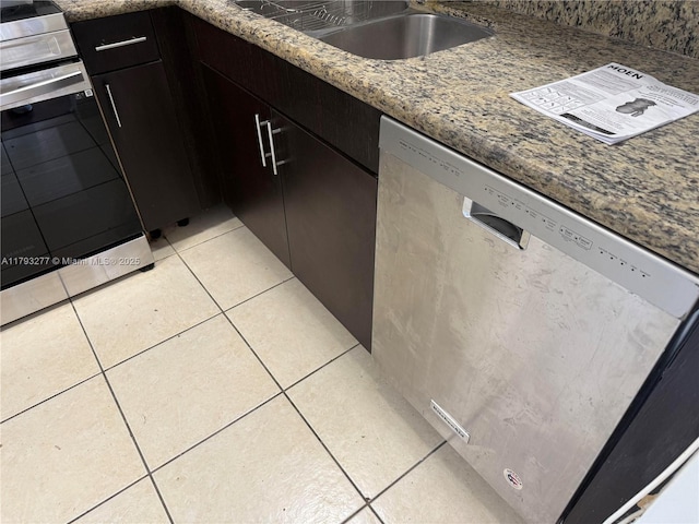 492 NW 165th St Rd Unit C-215, Miami, FL 33169 - kitchen featuring stainless steel dishwasher, stove, a sink, light tile patterned floors, and stone counters