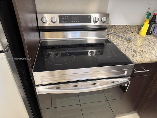492 NW 165th St Rd Unit C-215, Miami, FL 33169 - details featuring stainless steel electric range oven, fridge, and mail area