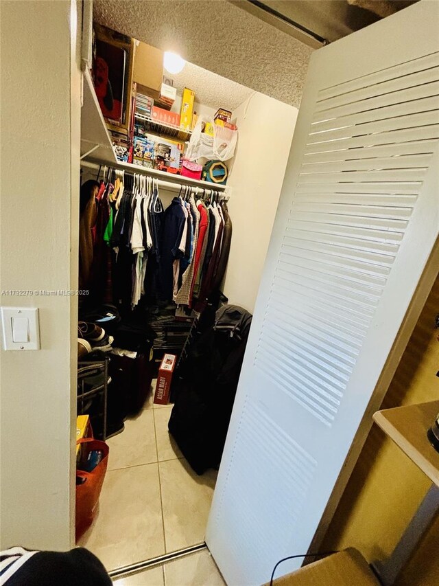 7705 Abbott Ave Unit 206, Miami Beach, FL 33141 - spacious closet with tile patterned floors