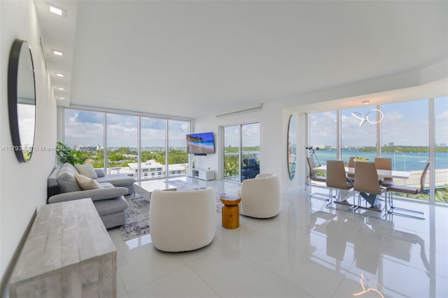 10275 Collins Ave Unit 731, Bal Harbour, FL 33154 - tiled living room with plenty of natural light and a chandelier