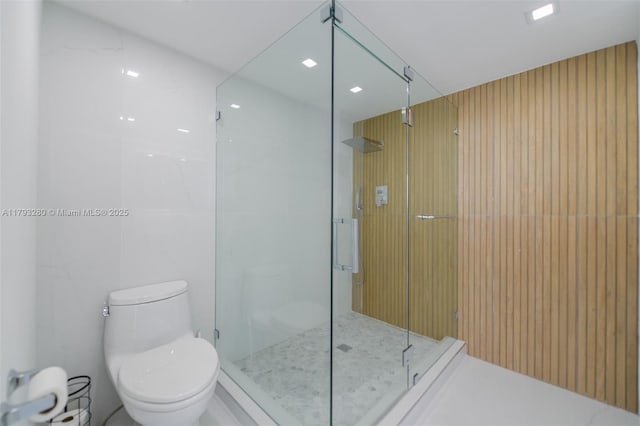 10275 Collins Ave Unit 731, Bal Harbour, FL 33154 - bathroom featuring toilet and a stall shower