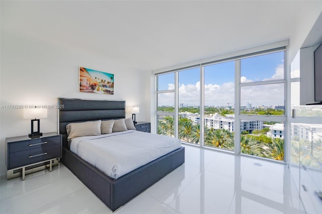 10275 Collins Ave Unit 731, Bal Harbour, FL 33154 - bedroom with light tile patterned flooring, a view of city, and floor to ceiling windows