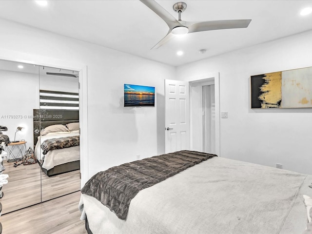 bedroom with recessed lighting, light wood finished floors, and ceiling fan