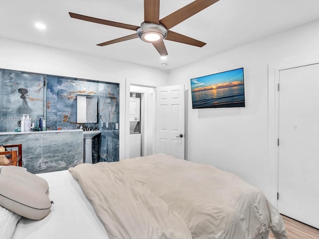 bedroom with recessed lighting, ceiling fan, and wood finished floors