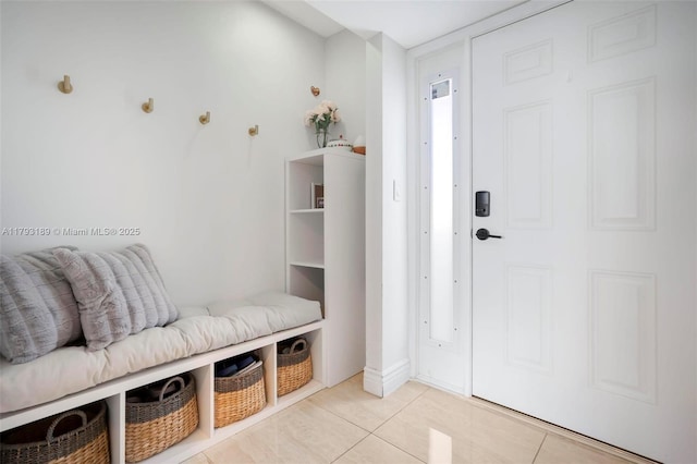 2767 S Carambola Cir S Unit 506, Coconut Creek, FL 33066 - mudroom with light tile patterned floors
