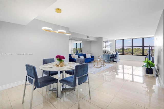 tiled dining area with baseboards