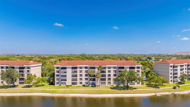 2767 S Carambola Cir S Unit 506, Coconut Creek, FL 33066 - aerial view of apartment complex / building and a nearby body of water