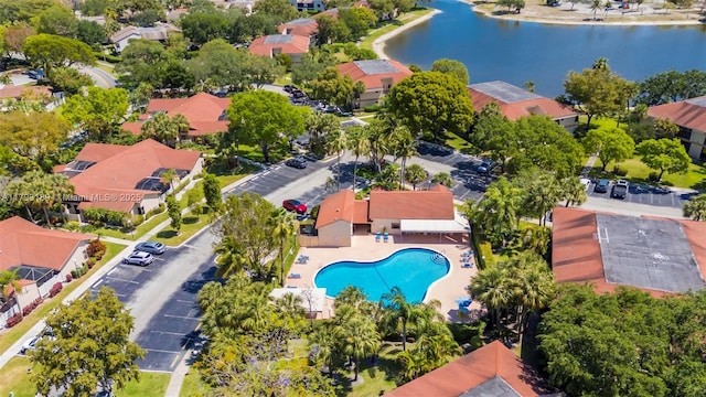 birds eye view of property featuring a residential view and a water view