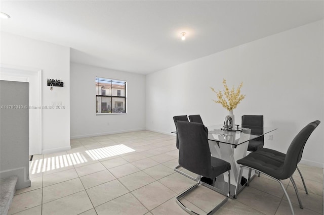 12901 SW 232nd Ln, Homestead, FL 33032 - dining space featuring baseboards and light tile patterned floors