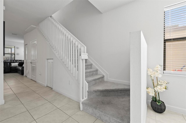 12901 SW 232nd Ln, Homestead, FL 33032 - stairs featuring tile patterned flooring and baseboards
