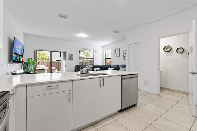 12901 SW 232nd Ln, Homestead, FL 33032 - kitchen with a sink, light countertops, stainless steel appliances, open floor plan, and visible vents