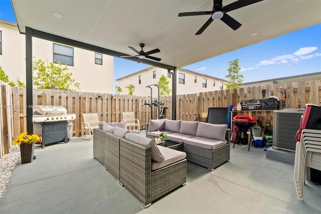 12901 SW 232nd Ln, Homestead, FL 33032 - view of patio featuring grilling area, cooling unit, a fenced backyard, an outdoor living space, and a ceiling fan