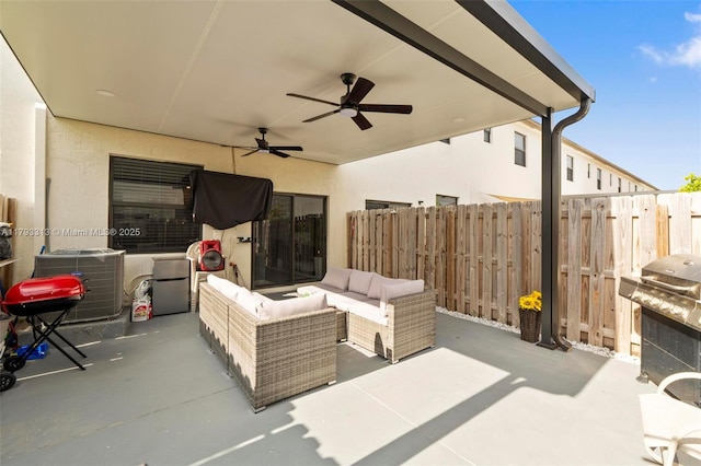 12901 SW 232nd Ln, Homestead, FL 33032 - view of patio with ceiling fan, central AC, fence, grilling area, and an outdoor hangout area