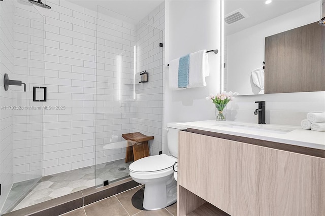 398 NE 5th St Unit 2517, Miami, FL 33132 - full bathroom with tile patterned flooring, vanity, toilet, a shower stall, and visible vents
