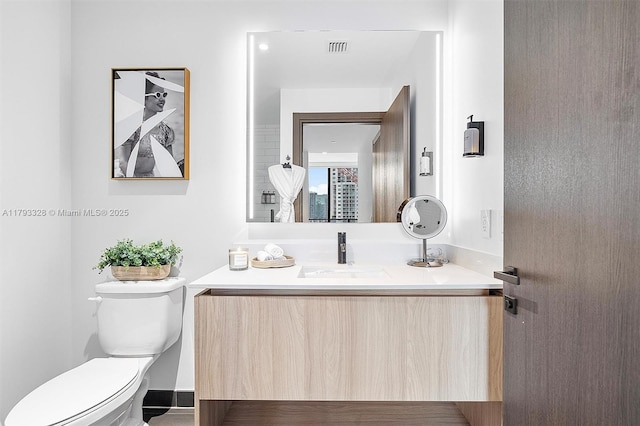 398 NE 5th St Unit 2517, Miami, FL 33132 - bathroom with toilet, visible vents, and vanity
