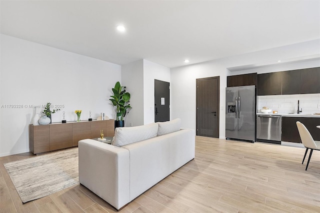 398 NE 5th St Unit 2517, Miami, FL 33132 - living room with recessed lighting and light wood-style flooring