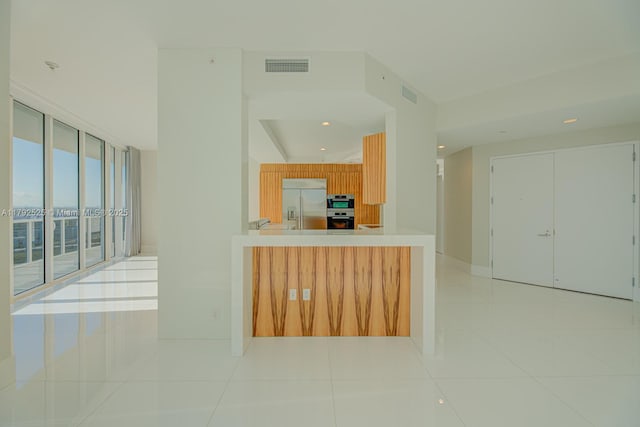 kitchen with visible vents, recessed lighting, appliances with stainless steel finishes, and light tile patterned floors