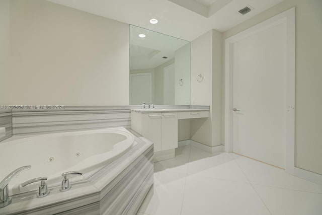 bathroom with tile patterned flooring, vanity, a whirlpool tub, recessed lighting, and visible vents