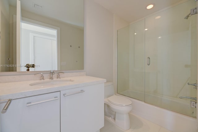 full bathroom featuring tile patterned flooring, vanity, bath / shower combo with glass door, toilet, and recessed lighting