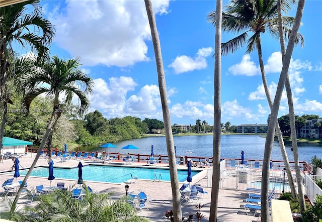 2141 SW 93rd Way Unit 704, Davie, FL 33324 - community pool with a patio and a water view