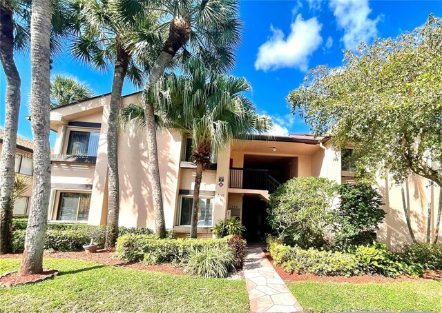 2141 SW 93rd Way Unit 704, Davie, FL 33324 - view of front of home featuring stucco siding and a balcony