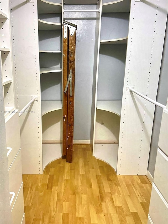 2141 SW 93rd Way Unit 704, Davie, FL 33324 - spacious closet with wood finished floors