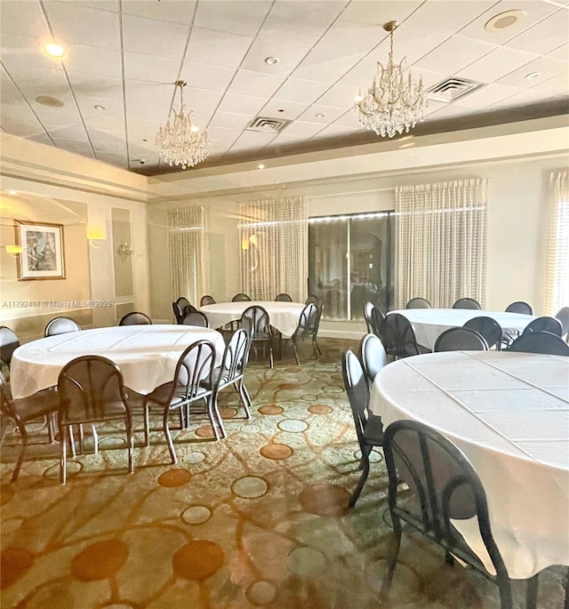dining area with visible vents, recessed lighting, and a notable chandelier