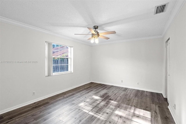 unfurnished room with crown molding, a ceiling fan, a textured ceiling, and visible vents