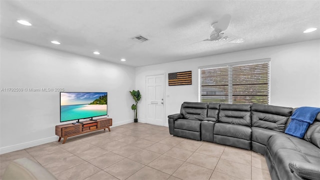 living room with a ceiling fan, recessed lighting, light tile patterned flooring, and visible vents