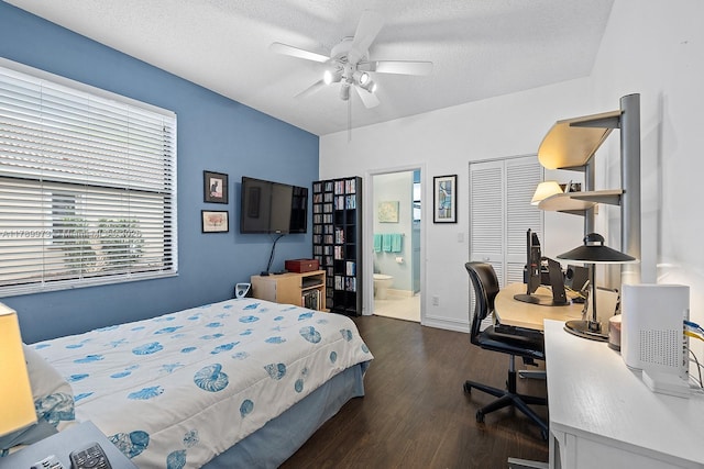 bedroom with a closet, wood finished floors, ceiling fan, a textured ceiling, and connected bathroom