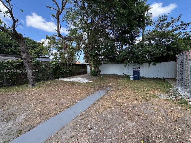 view of yard featuring a fenced backyard