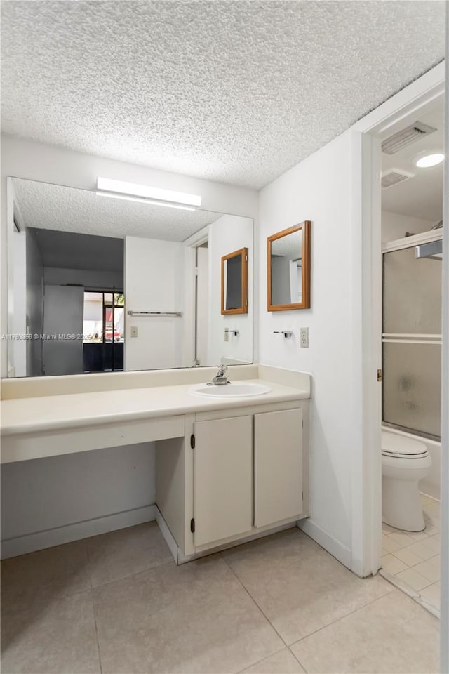 full bathroom featuring toilet, tile patterned floors, visible vents, and vanity