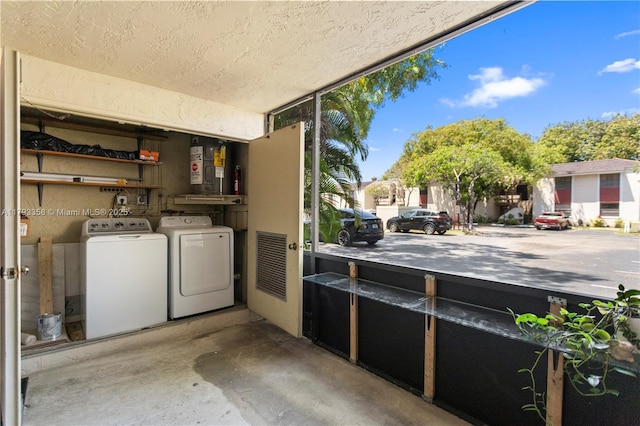 exterior space featuring washing machine and dryer and a balcony