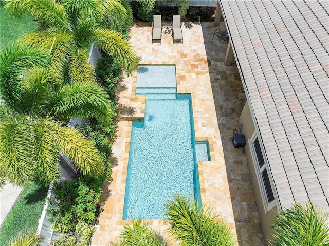 6017 NW 56th Cir, Coral Springs, FL 33067 - swimming pool with a patio