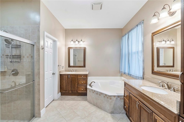 6017 NW 56th Cir, Coral Springs, FL 33067 - full bathroom featuring a shower stall, a garden tub, tile patterned flooring, and two vanities