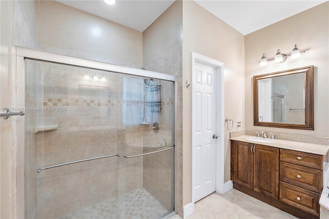 6017 NW 56th Cir, Coral Springs, FL 33067 - bathroom featuring vanity, a stall shower, and tile patterned flooring