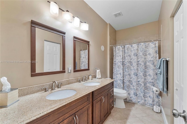 6017 NW 56th Cir, Coral Springs, FL 33067 - bathroom with tile patterned flooring, double vanity, toilet, and a shower with curtain