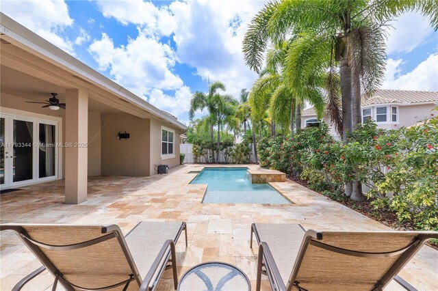 6017 NW 56th Cir, Coral Springs, FL 33067 - view of pool featuring a patio area, ceiling fan, french doors, and a fenced backyard
