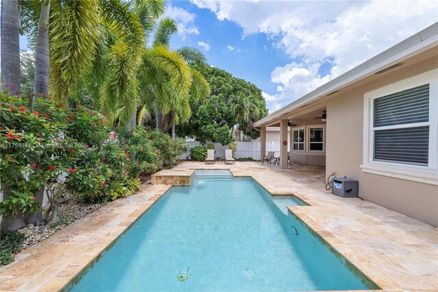 6017 NW 56th Cir, Coral Springs, FL 33067 - view of swimming pool featuring a patio area and a ceiling fan