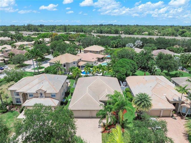 6017 NW 56th Cir, Coral Springs, FL 33067 - aerial perspective of suburban area featuring a tree filled landscape