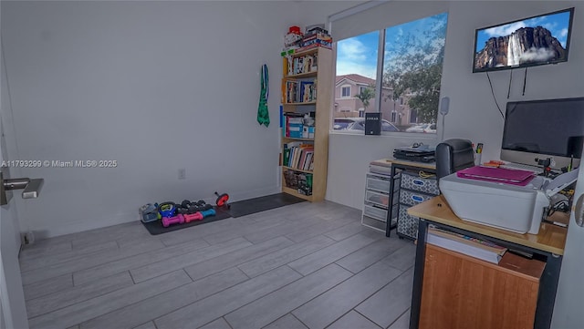 home office featuring wood finished floors