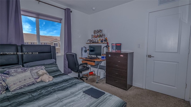 bedroom featuring carpet