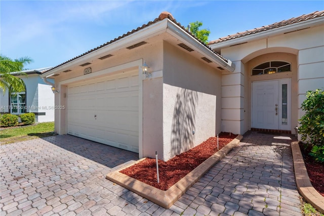 exterior space with decorative driveway