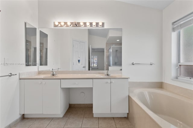 full bath with a sink, double vanity, tile patterned floors, a shower stall, and a bath